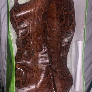 Tall  brown snakeskin boots